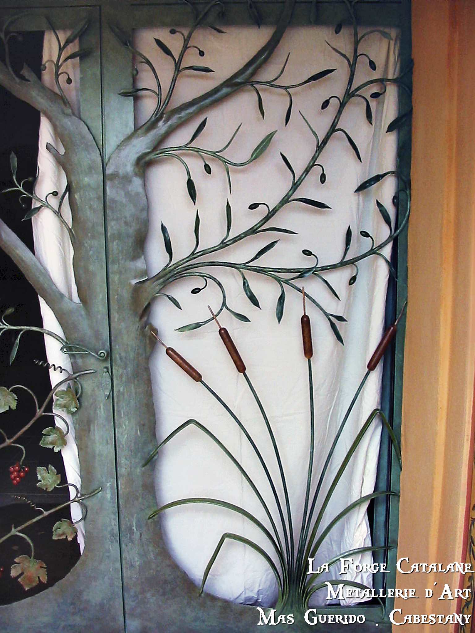 porte vegetale roseaux travail forge 5 forge catalane.jpg